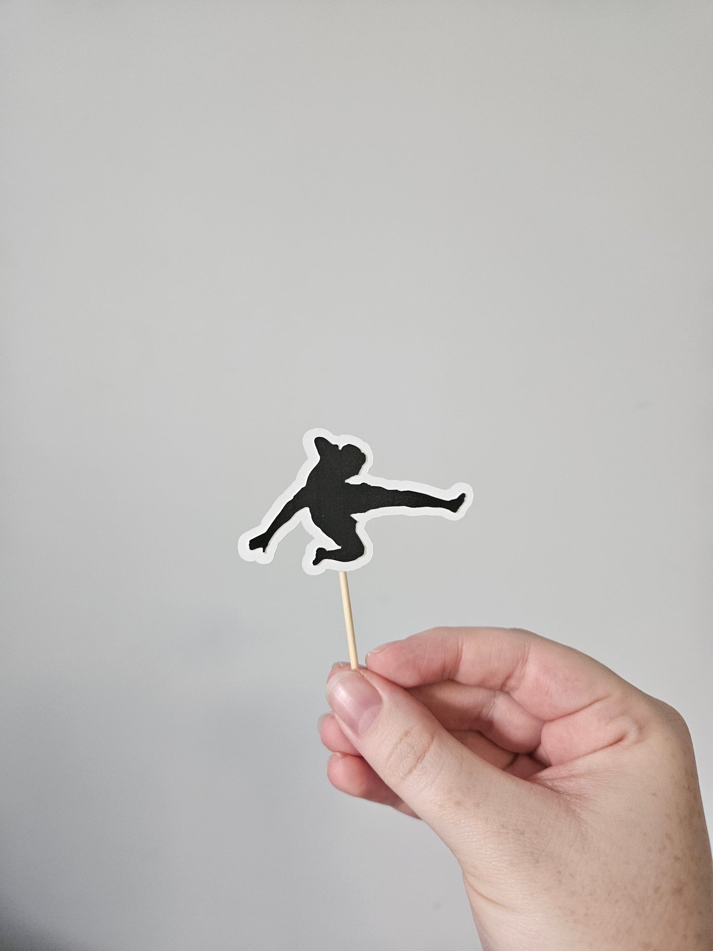 Soccer player topper on white background