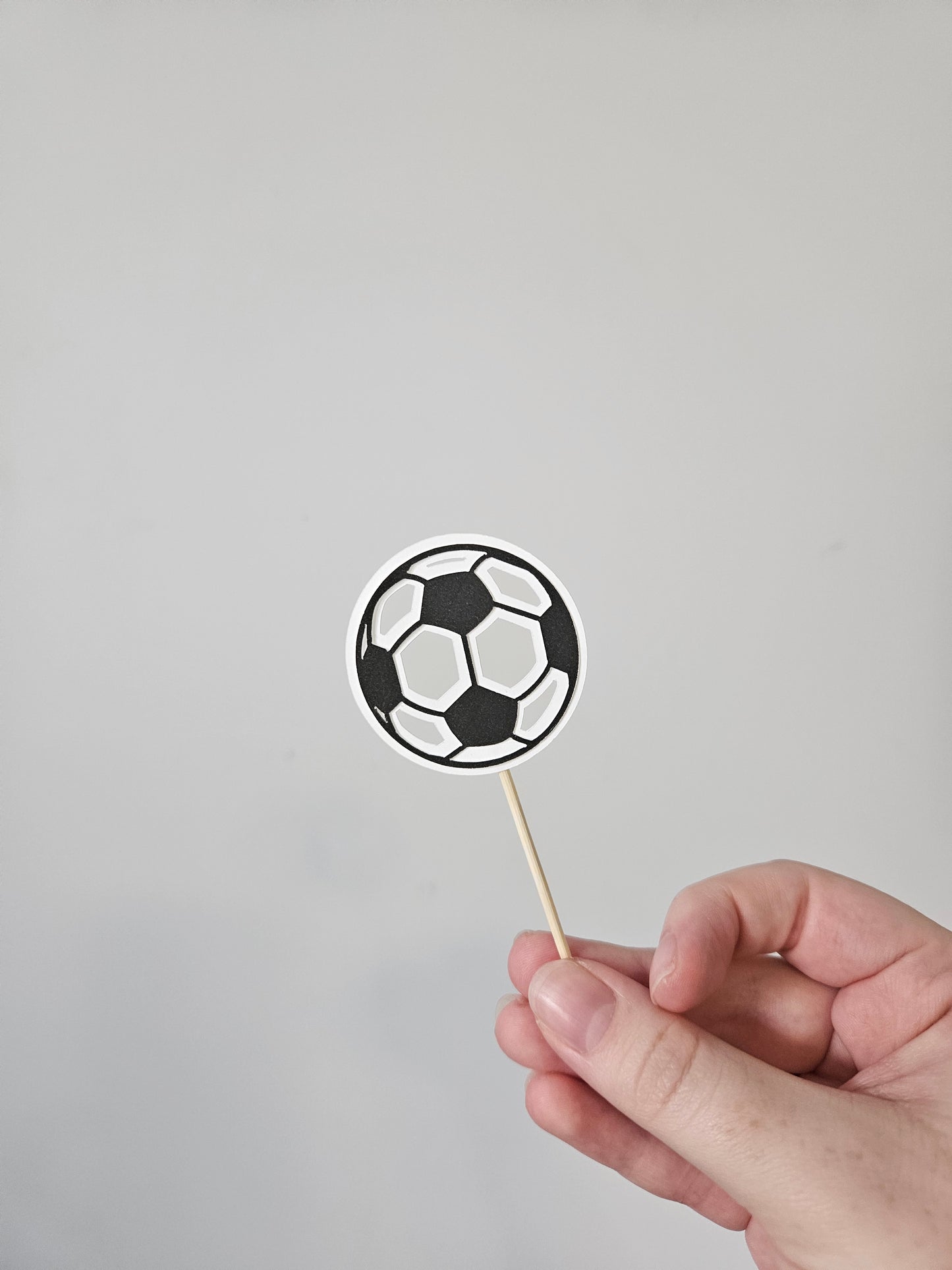 Soccer ball topper on white background