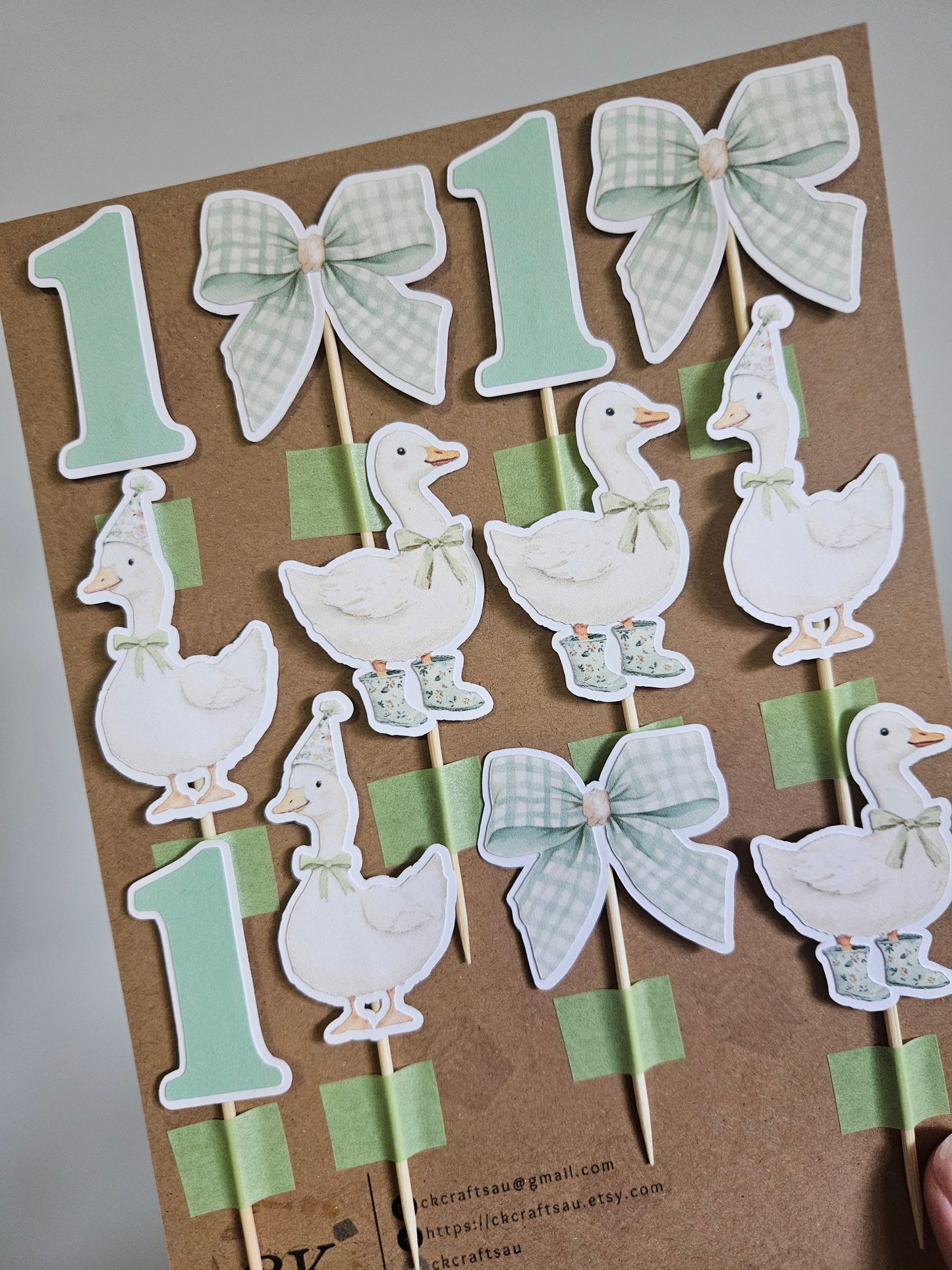 display of goose cupcake toppers on card backing
